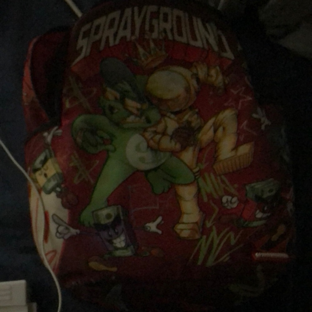 Sprayground Red and Green Character Backpack